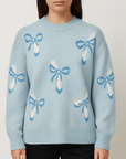Meluvie | Oversized wool knit sweater with jacquard bow pattern