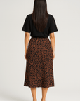 Hailey | Effortless Casual Chic: A Relaxed T-Shirt and Patterned Midi Skirt Combo